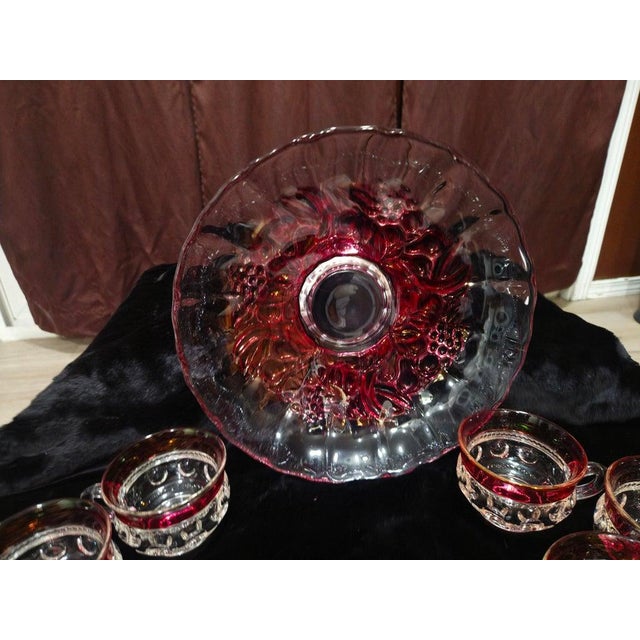 mid-century sophistication to your next gathering or holiday table with this striking 9-piece vintage entertainment set....