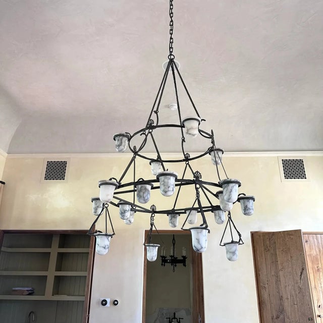 3 Tier wrought iron chandelier with alabaster cups in the style of Villa Kerylos in France.