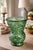 ntage Anchor Hocking emerald green textured art glass vase featuring sculptural organic relief and rich jewel-tone color....