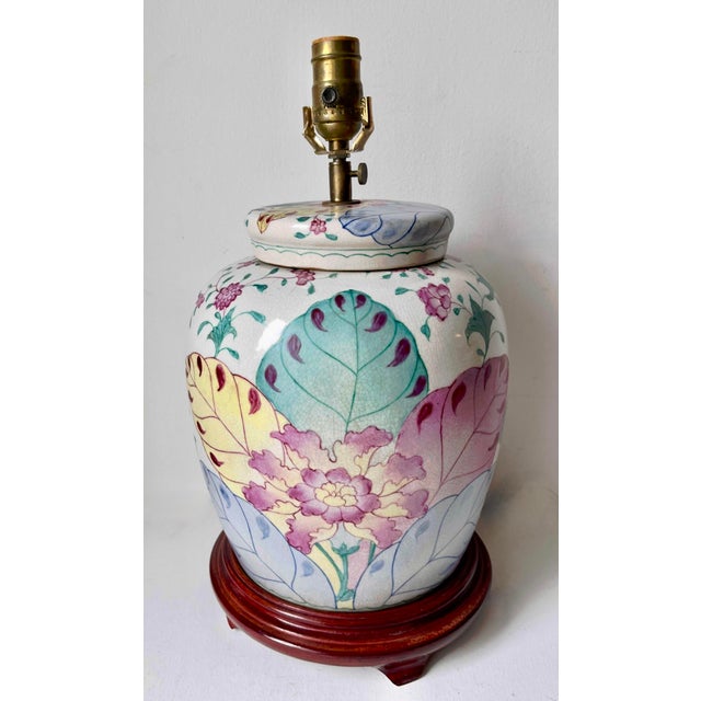 This gorgeous vintage Tobacco Leaf Chinoiserie ceramic lamp features a Pastel palette of soft Pinks, Blues and Aqua on a...
