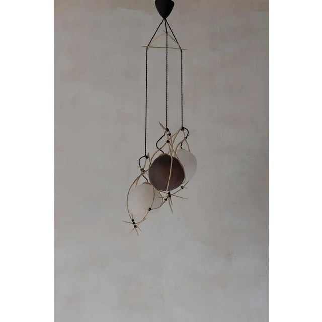 Hermanos sculpted suspension lighting by je´ro^me pereira dimensions: 50 x 50 x 40 cm. Edition: unique. Title: hermanos....