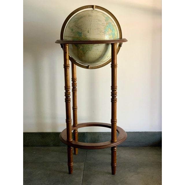 A vintage globe on a wooden stand is an ever lasting source of joy. To lose oneself in dreams of faraway countries, maybe...