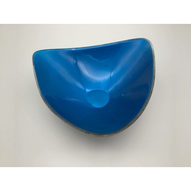 A cool vintage reed and baron silver plated three sided bowl with turquoise blue enamel on the inside. The triangle shaped...