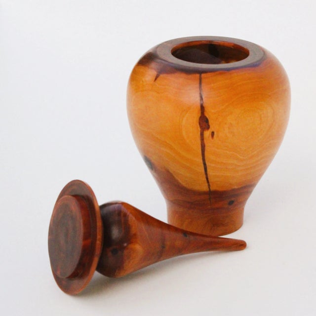 Artist signed carved sculptural lidded pot. Made of juniper wood and various other wood. Want to explore more products at...