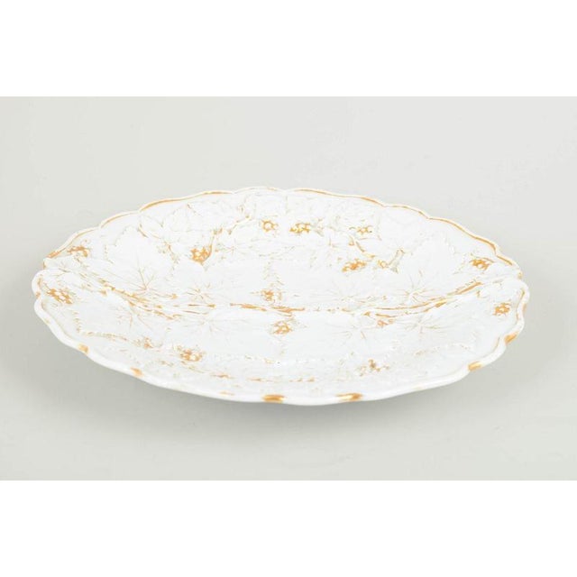 Meissen Antique dish, 19th century. Porcelain dish by Meissen with relief-moulded leaf decoration and hand-painted gilt...