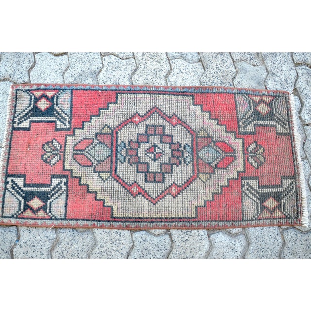 This is a vintage Turkish Oushak rug from the 1960s. The piece was hand-knotted.