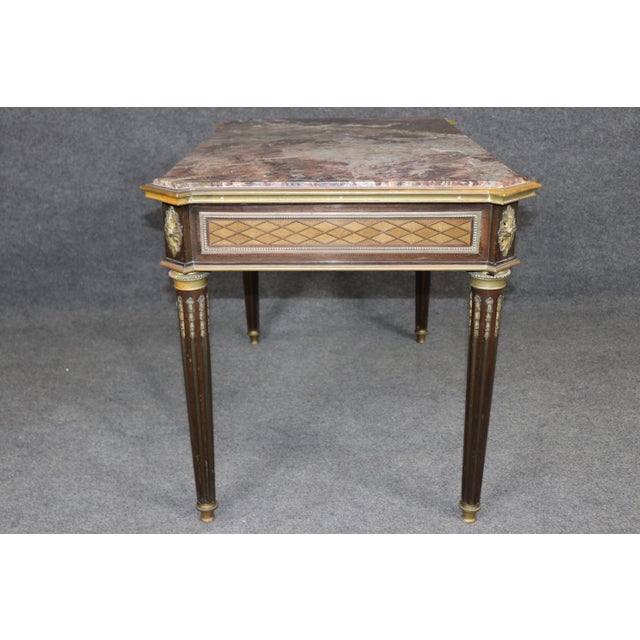 Discover the charm and rarity of this exceptional 19th century French Louis XV style child-size parquetry desk, a...