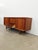 Authentic vintage mid century modern teak credenza / sideboard / console. This piece is in excellent condition with very...