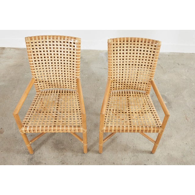 McGuire Set of Four McGuire Woven Rawhide Rattan Dining Armchairs For Sale - Image 4 of 13