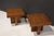 A pair of square cocktail occasional tables with refinished walnut tops and bases. In the Style of Milo Baughman,...