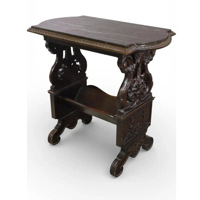 1920's Highly Carved Side Table w/Marble Top. Intricately carved antique Renaissance Revival side table with bookcase...