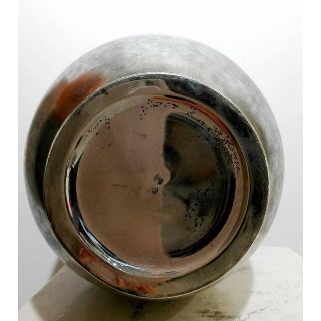 Buccellati Vase, circa 1940 - Fascist period. Silver 800 with fully machined chisel body. Neck decorated with four grooved...