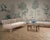 A gorgeous pair of sculptural bleached rattan organic modern cathedral sofas made by McGuire, San Francisco, CA. The grand...