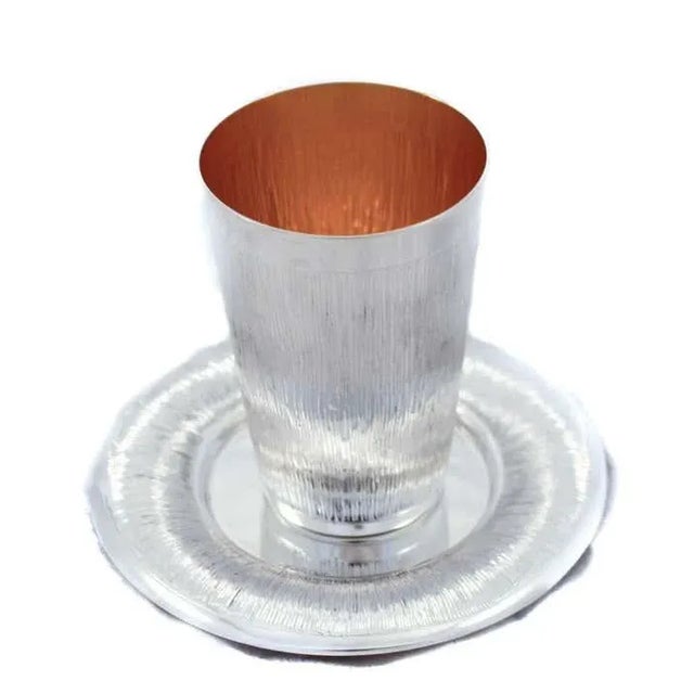 We are happy to offer you this sterling silver wine cup and plate. It has a masculine striped design with a matte finish....