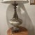 Crafted with an eye for elegance, this Art Deco table lamp effortlessly brings a touch of vintage glamour to any space....