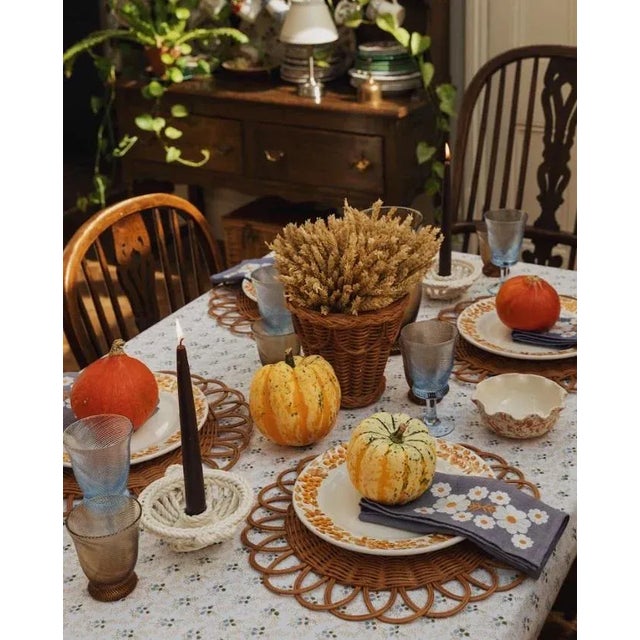 Our Tulpina napkins are made from hand-loomed linen and embroidered by artisans, featuring a floral design inspired by...