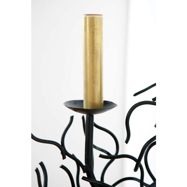 Pair of faux coral black sconces. Double Arm Sconce also listed and matching chandelier. Brass candle covers are newly made.