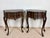 Elegant pair of French Louis XV style nightstands, featuring graceful bombe fronts, finely carved details, and beautifully...