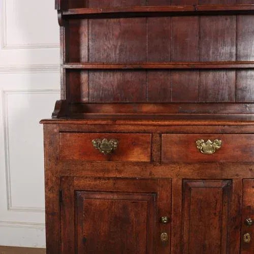Very small 18th C English oak dresser with a good colour. 1740. This piece is designed in the style of the selected...