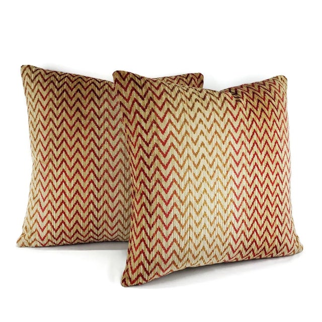 From Colefax and Fowler is Jerome in the color Red pillow cover. This pillow features colors of red and gold in a chevron...