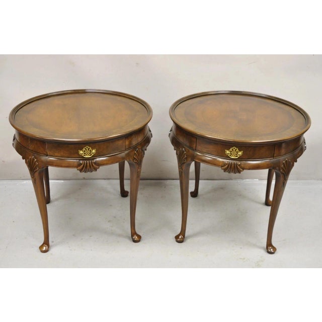 Vintage Baker Furniture English Queen Anne Style Burl Walnut Round Lamp End Tables - a Pair. Tables feature single...