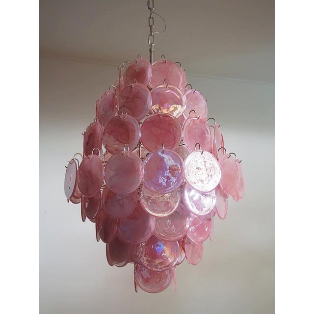 Vintage Italian Murano chandelier in Vistosi style. The chandelier has 87 fantastic pink alabaster iridescent glasses in a...