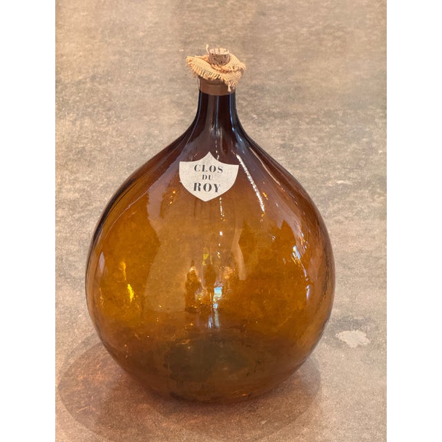 Amber Glass Demijohn, Labeled Clos Du Roy For Sale - Image 4 of 5