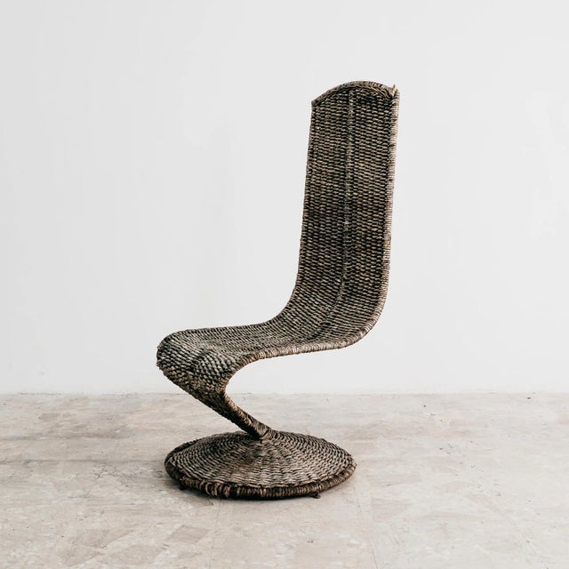 A rare, spectacular, and iconic "S"-shaped armchair (S-Chair) designed by renowned Florentine architect and designer...