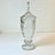 A beautiful Boho Chic Etched Crystal Urn Vase from Yugoslavia will grace any room. The design has three frosted ovals with...