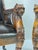 A stately pair of Regency style armchairs by Theodore Alexander. These exceptional chairs feature carved solid wood frames...