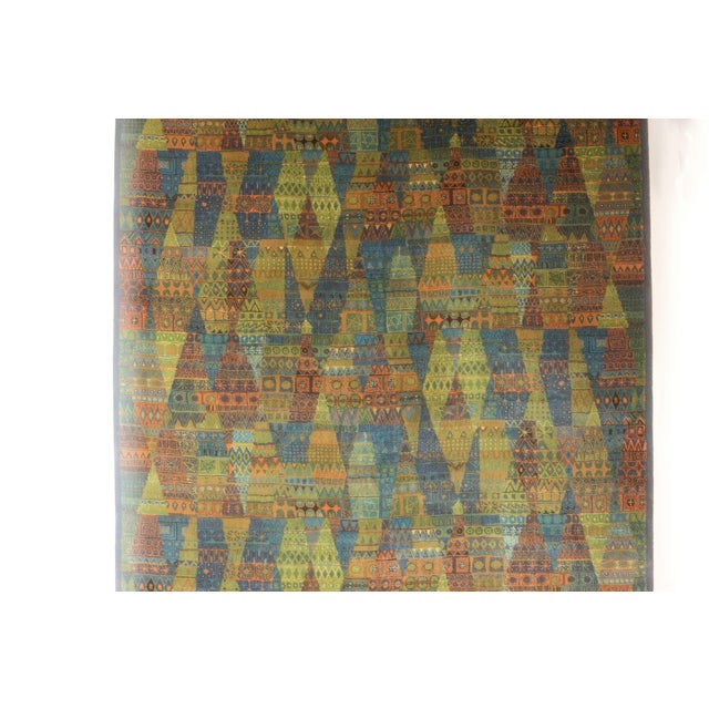 - Motifs reminiscent of designs by Paul Klee - Produced by Vorwerk in the 1960s - Warm colors & geometric decor This piece...