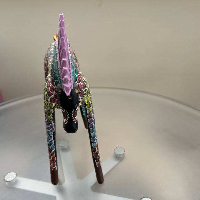 Signed hand painting Mexican horse, signed on his belly by the artist. The tail is removable. Beautiful lavender, green...