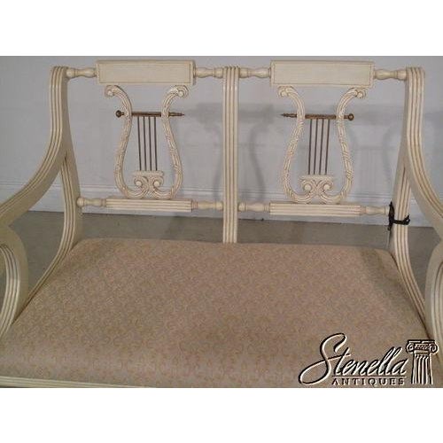 Model #: JI-11498-pw Details: Gorgeous detailed Lyre back Brass accents Carved claw feet and nice rolled arms Custom white...