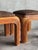 This elegant pair of vintage pencil reed stools or ottomans dates to the 1970s and showcases a sculptural four-leg...