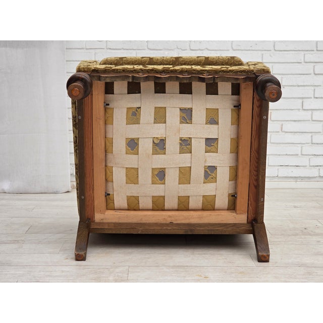 1960s, Danish armchair. Original green furniture velour, carved oak wood, springs in the seat cushion. Original good...