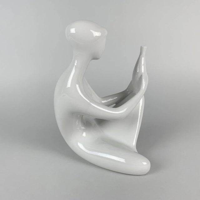 Porcelain statue by Jitka Forejtova in the 1960s, manufactured by Royal Dux probably a bit later. Gorgeous porcelain...