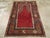 This Early 20th century Turkish Anatolian rug, measuring 3' 8" x 5' 5", is a striking example of the devotional weaving...