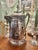 This is a late-19th-century silver-plated ice water pitcher by Reed & Barton of Taunton, Massachusetts, dating to circa...