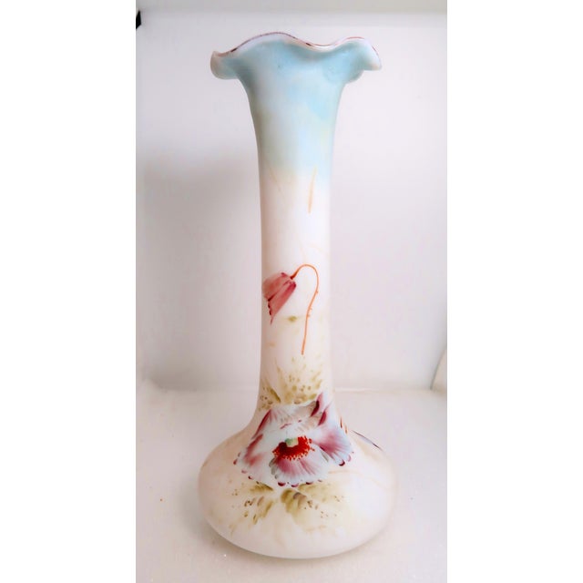 Lovely tall porcelain vase with hand-painted flowers and fluted mouth. Size: 11 1/4 inches tall; Base Diameter 5 1/4...