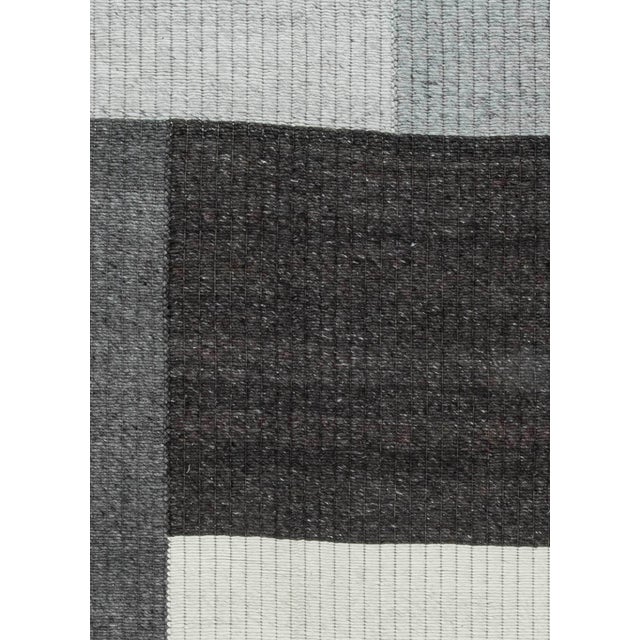 Modern geometric grey, white and black flat-woven wool carpet. Size: 13'2" × 17'7" (401 × 535 cm). A perfect mix of chic...