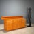 1980s burl wood sideboard with open hutch, featuring a functional and linear design typical of the era. Made of burl wood...