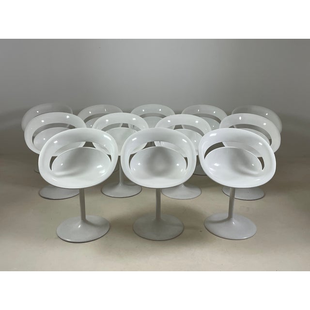 Set of 12 "tina" swivel chairs designed by arik levy for softline, 1979, and made in italy. White lacquered metal tulip...