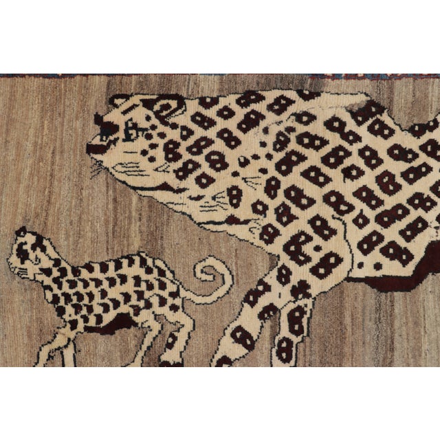 Hand-knotted in wool and originating circa 1950-1959 from Afghanistan, this 3x8 vintage Gabbeh runner joins Rug & Kilim’s...