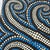 Original dot mandala painting features intricate swirling patterns in a palette of blue, cream, and brown. This...