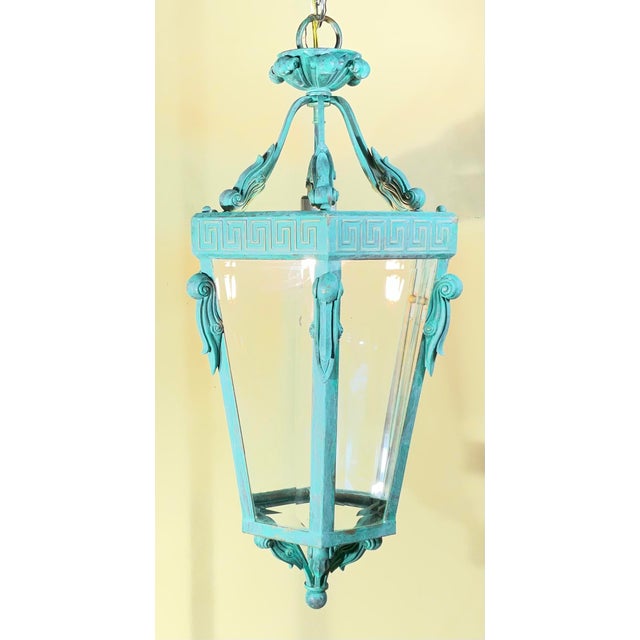 Elevate your space with this breathtaking Vintage Neoclassical Lantern Chandelier. Expertly crafted from solid galvanized...