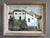 SUNLIT FACADES Size: 12.6 x 16.5 inches (including frame) Oil on canvas A charming mid-century modernist painting that...