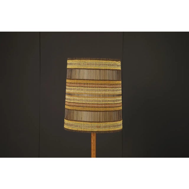 A rare and striking lampshade designed by German-born, California-based textile artist Maria Kipp, celebrated for her...