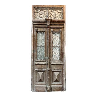 Antique Entry Doors With Wrought Iron Window Grilles - A Pair For Sale