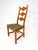 Set of four dining chairs by Henning Kjaernulf for Nyrup Mobelfabrik. Sculpted solid Oak carved frames have a warm rustic...