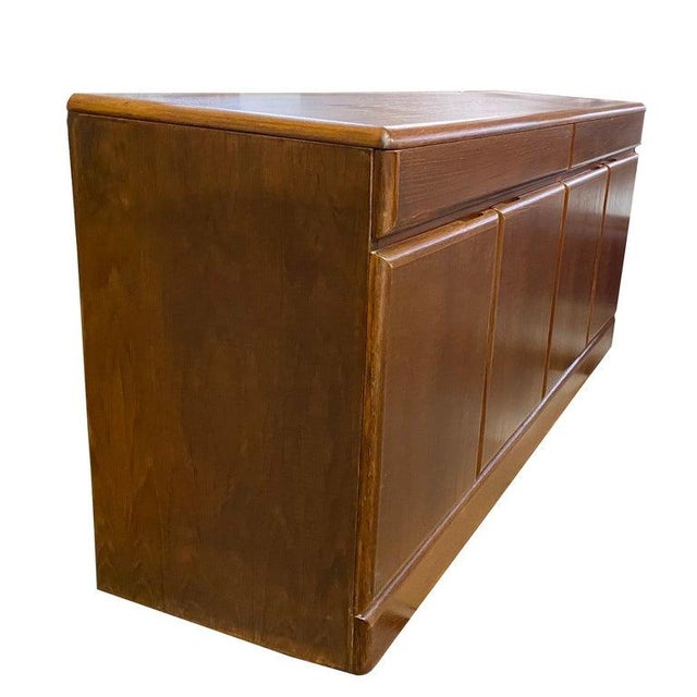 Vintage mid century teak Credenza Ample storage for dining and silverware with 2 top drawers and storage below.